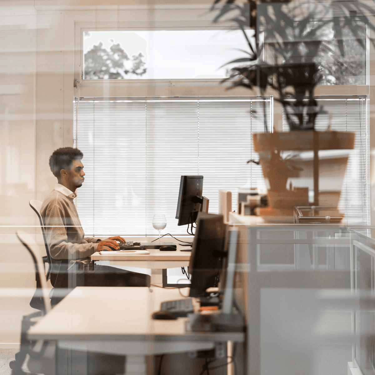 Employee at desk computer screen