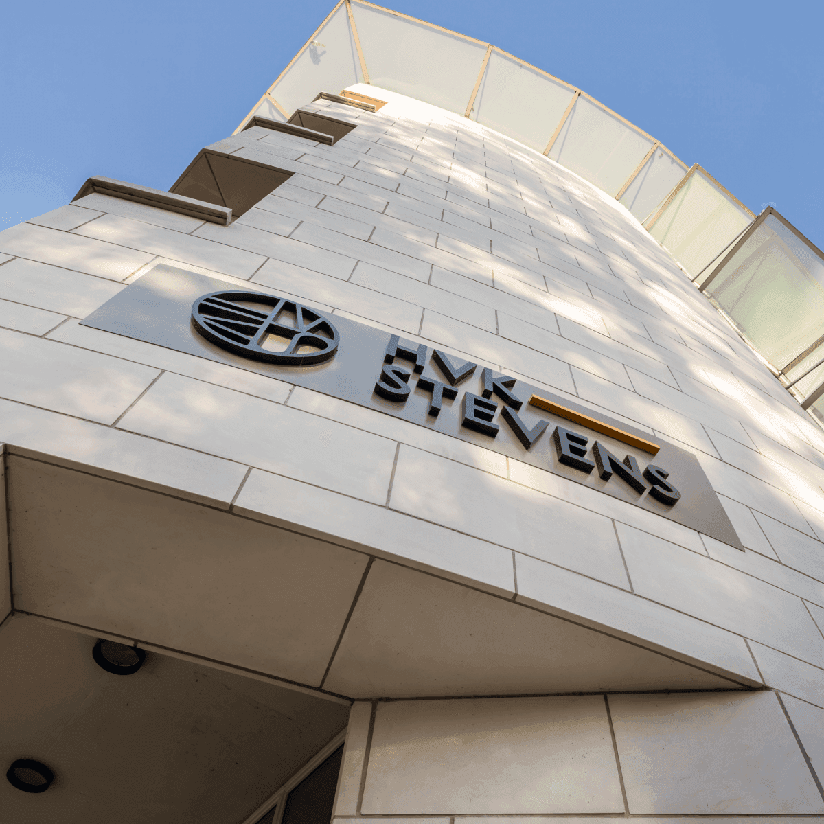 Hvk stevens logo on building facade